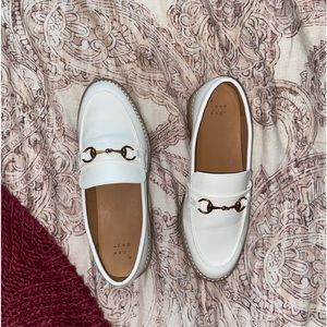 White Loafers with Gold Buckle